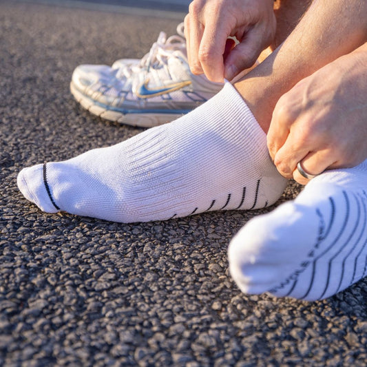 White performance trainer socks by Swole Panda